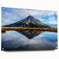 Mid-century modernist art of Mount Taranaki in muted earth tones on acrylic glass, ideal for nursery wall decor.