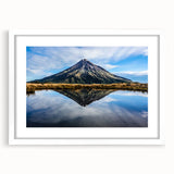 Abstract art print of Taranaki, New Zealand, in muted earth tones on a framed white mat, suitable for dining room decor.