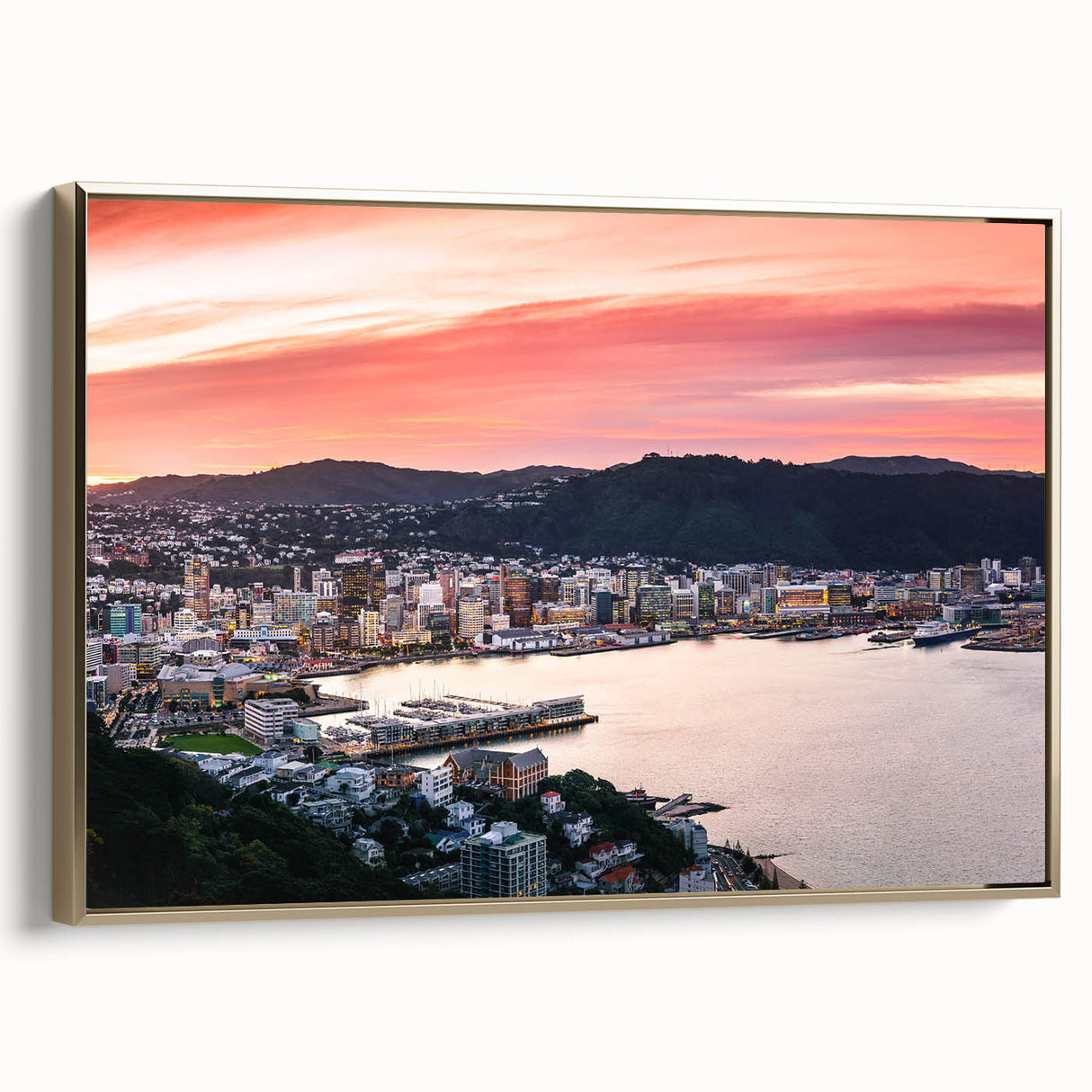 Framed canvas featuring a vintage-style landscape painting of Wellington, New Zealand, with muted gold and black tones.