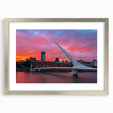 Textured abstract art print depicting a muted color palette of Buenos Aires, framed in silver, ideal for bedroom decor.