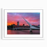 Abstract art print of Buenos Aires skyline in muted blue and gray tones on a white framed canvas.