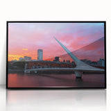 Large abstract wall art depicting Buenos Aires skyline in muted gray and blue tones, framed in black acrylic.