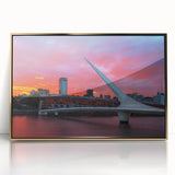 Large art print of Buenos Aires cityscape in muted gray and gold tones on acrylic, framed, in a mid-century modernist style.