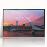 Mid-century modernist art of Buenos Aires skyline in muted silver and blue tones, acrylic print framed in silver.