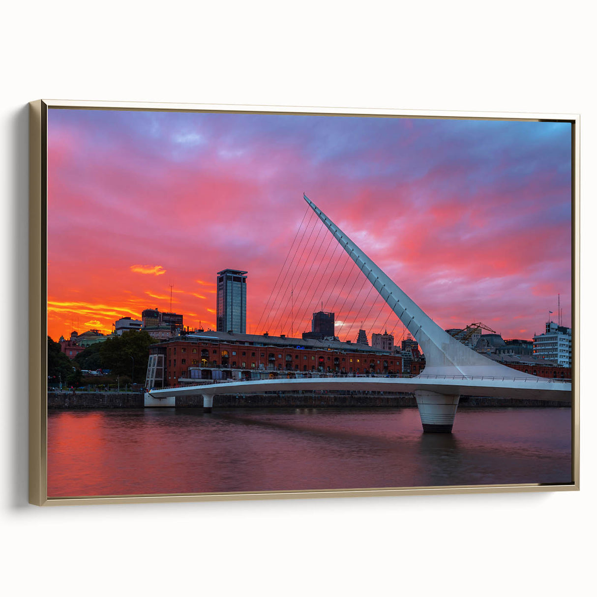 Framed canvas featuring a vintage-style landscape painting of Buenos Aires in muted gold and black tones.