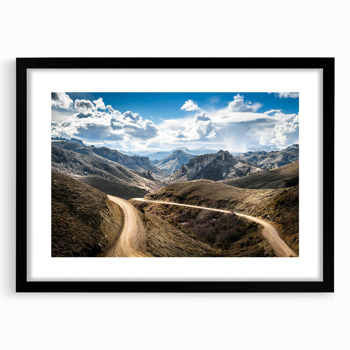 Extra large abstract art print of a colorful, textured Argentine landscape on a black framed canvas.
