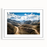 Abstract art print depicting an Argentine landscape in muted earth tones on a framed white mat.