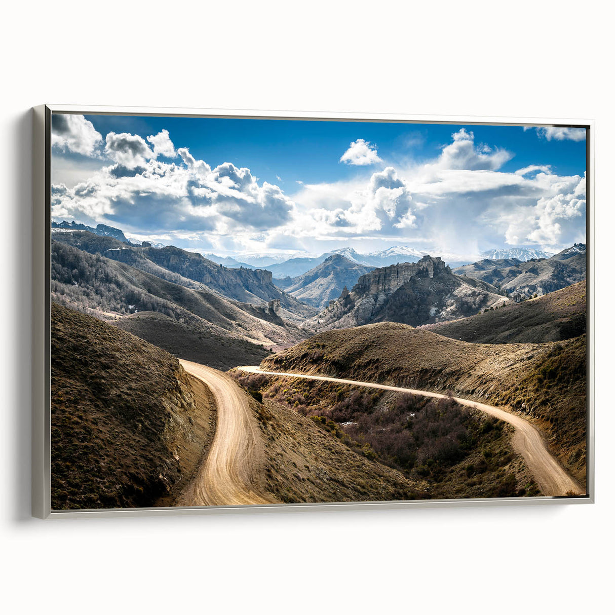 Landscape art painting of an Argentinian scenery on a silver-framed canvas.