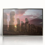 Mid-century modernist art of Easter Island statues in muted earth tones on a silver-framed acrylic print.