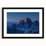 Colorful abstract art print of a South American landscape, in vibrant hues on a large framed canvas.