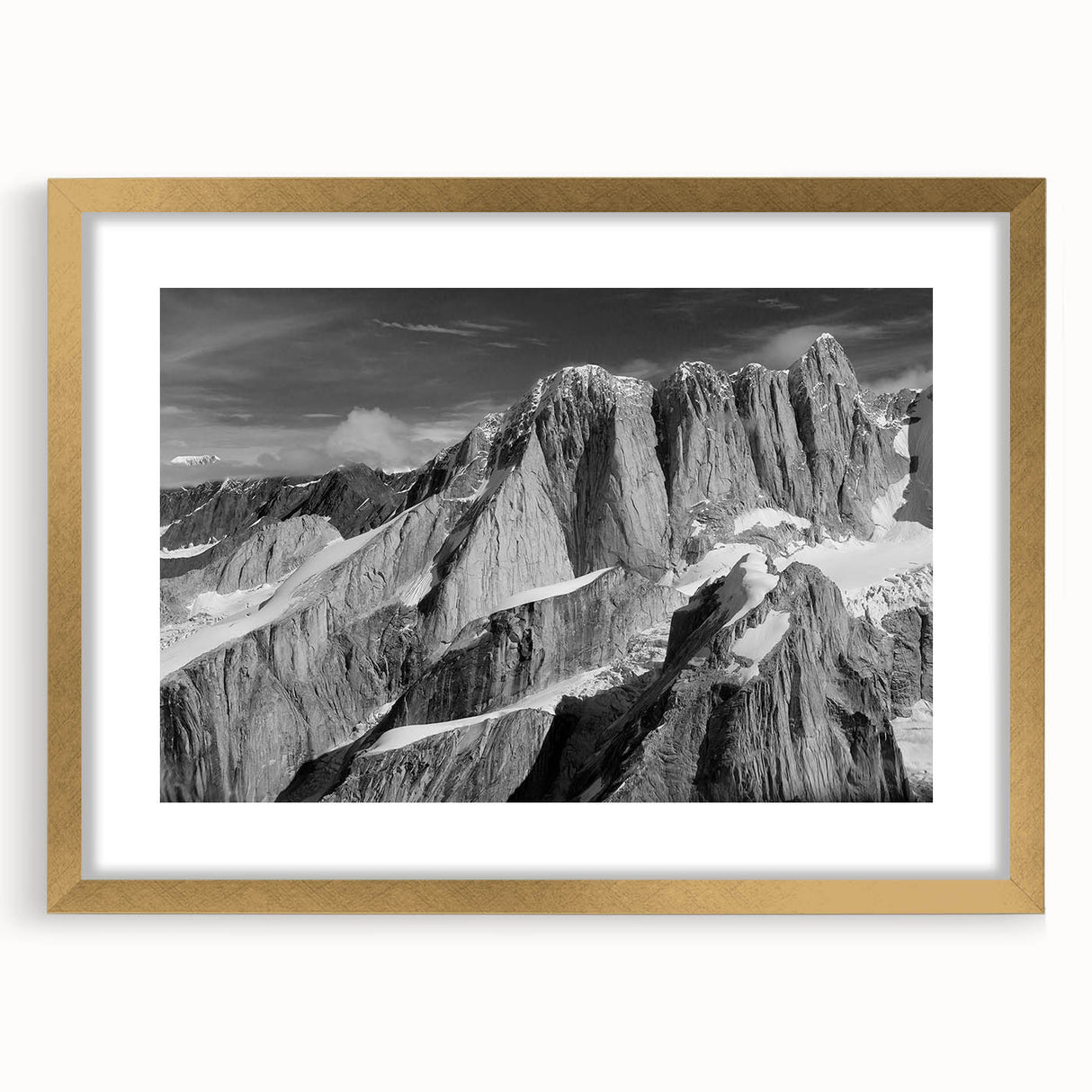 Extra large abstract art print of Denali, Alaska, in a gold frame, featuring textured brush strokes in earthy tones.
