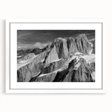 Abstract art print of Denali, Alaska in muted earth tones on a framed white mat, ideal for dining room decor.