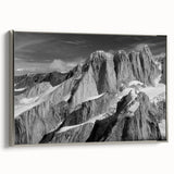 Framed canvas featuring a vintage-style landscape painting of Denali, Alaska, with a palette of black and vibrant colors.