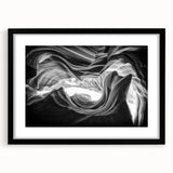 Abstract art print of Arizona Antelope Canyon in vibrant orange and red hues on a large textured canvas.