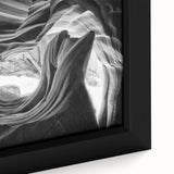 Extra large framed canvas of a textured Arizona Antelope Canyon in black with colorful highlights.