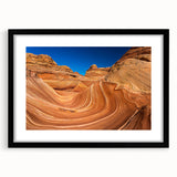 Extra large textured abstract art print of Arizona's Coyote Buttes in vibrant colors, framed with a black mat.