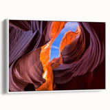 Vintage poster art of Arizona's Grand Canyon in vibrant colors on a white-framed canvas, ideal for living room decor.