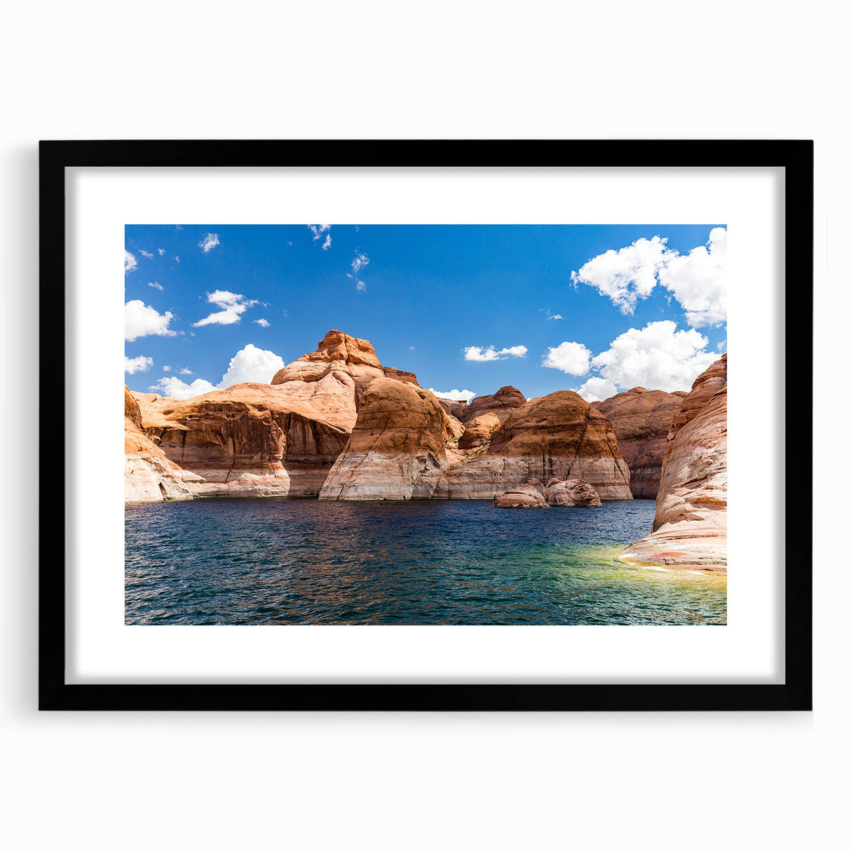 Extra large, textured abstract art print of Lake Powell with vibrant blues and reds, framed with a black mat.