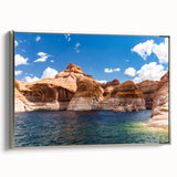 Framed canvas of Lake Powell landscape with vibrant blue and orange sky, suitable for living room decor.