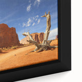 Extra large framed canvas of Monument Valley with textured black outlines and vibrant colors, suitable for living room decor.