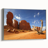 Framed canvas landscape art painting of Monument Valley in Arizona, featuring muted earth tones.
