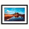 Abstract art print of Sedona scenery in vibrant colors on a textured, extra large canvas, framed in black.