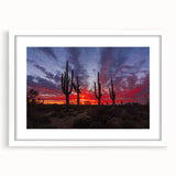 Abstract art print of the Sonoran desert in muted earth tones on a white framed canvas, suitable for dining room decor.