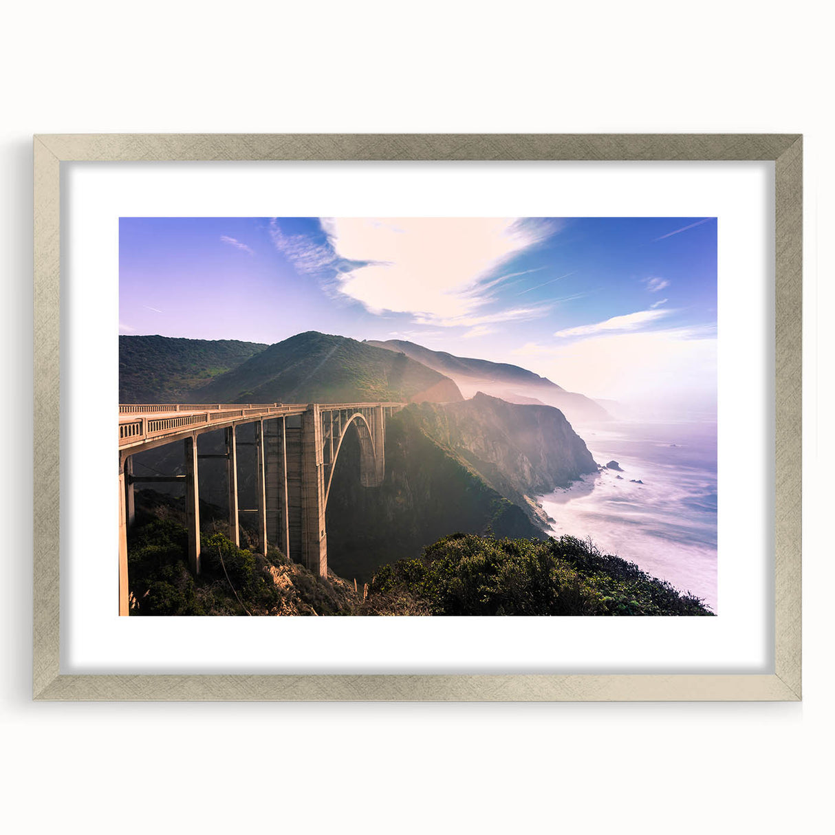 Textured abstract art print of California's Big Sur in muted earth tones on a framed canvas, ideal for bedroom wall decor.