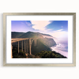 Textured abstract art print of California's Big Sur in muted earth tones on a framed canvas, ideal for bedroom wall decor.