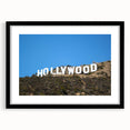 Extra large abstract art print of a colorful, textured Hollywood, California scenery on a black framed canvas.