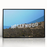 Large abstract wall art depicting the Hollywood, California skyline in muted gray tones, framed in black acrylic.