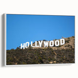Vintage poster art of Hollywood, California in vibrant colors on a large framed canvas, ideal for living room decor.