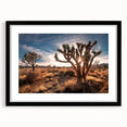 Extra large abstract art print of Joshua Tree in vibrant, colorful hues on textured canvas, ideal for living room decor.