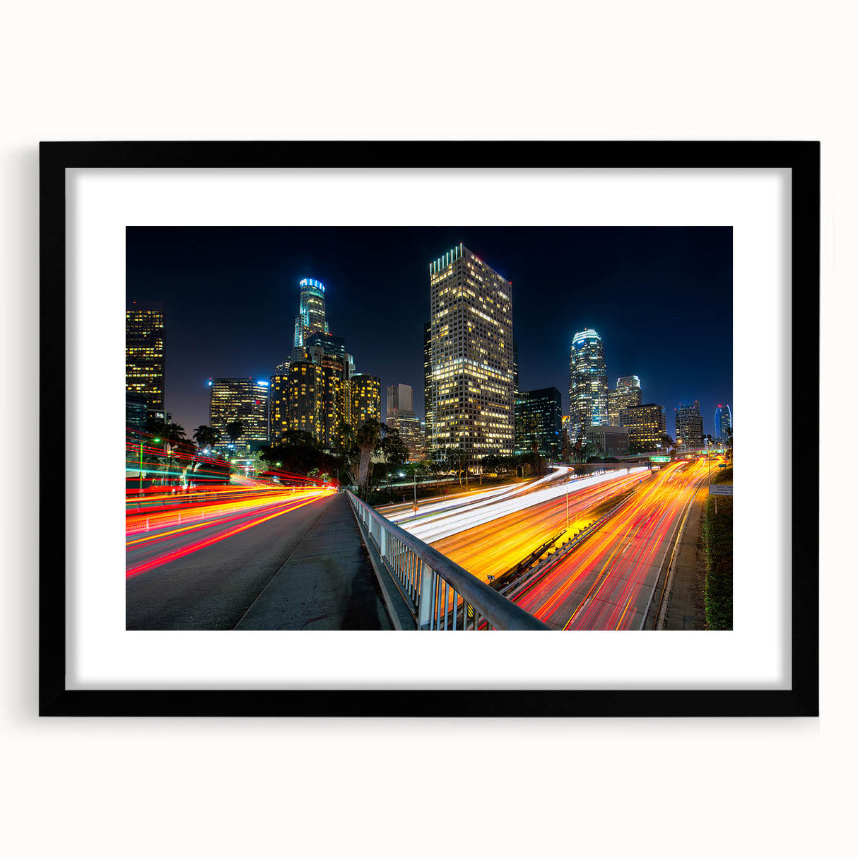 Abstract art print of Los Angeles skyline in vibrant, colorful hues on a large textured canvas, ideal for living room decor.