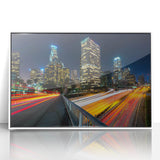 Framed acrylic print of Los Angeles skyline in art deco style with muted gray and blue tones.