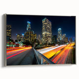 Framed canvas landscape art painting of Los Angeles with colorful skyline and black accents.