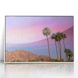 Art deco style poster of Palm Springs with pastel pink and blue tones, framed in white acrylic.