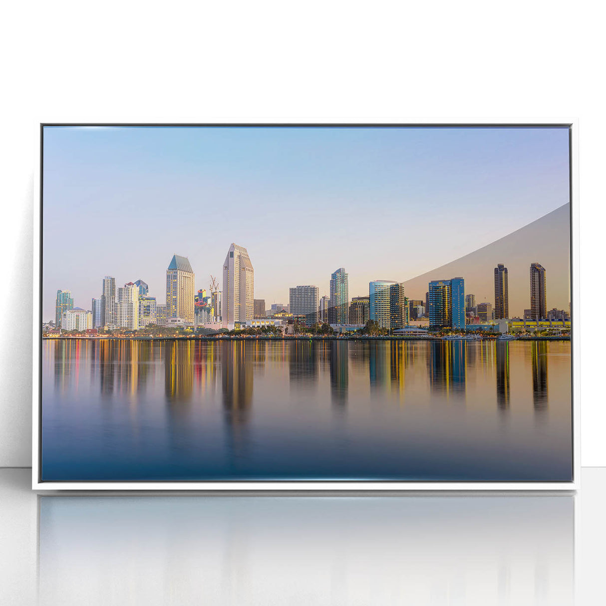 Acrylic print of San Diego skyline in art deco style, with pastel hues, framed in white, suitable for modern nursery decor.