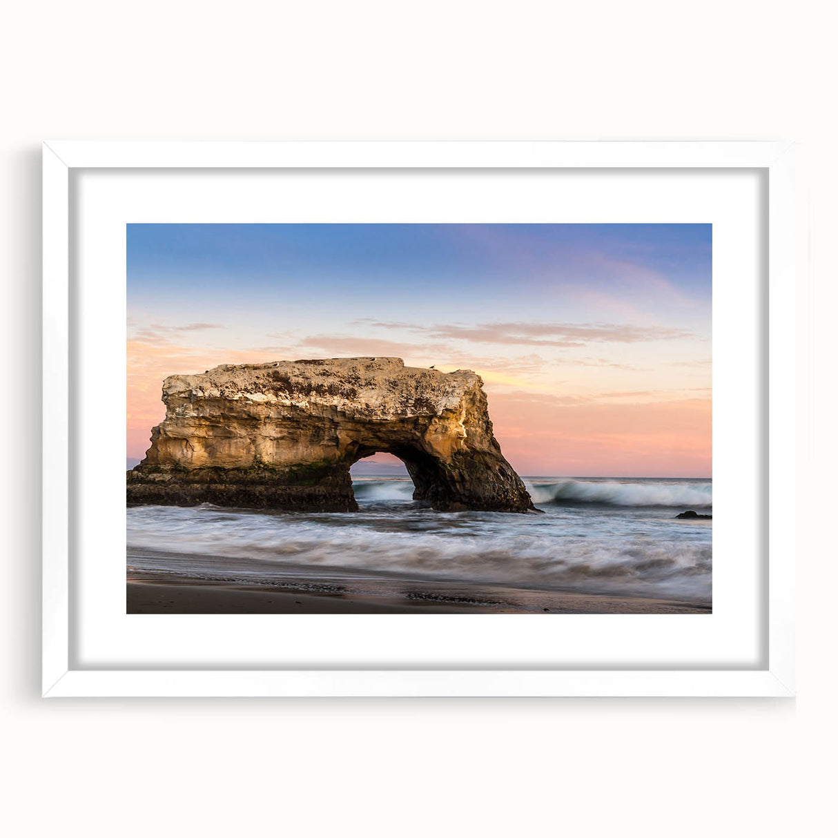 Abstract art print of Santa Cruz scenery in muted blue and green tones on a white framed canvas.
