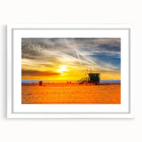 Abstract art print of Santa Monica scenery in muted blue and gray tones on a white framed canvas.