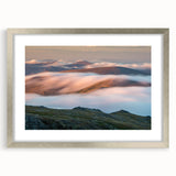 Textured art print of abstract Vail, Colorado scenery in muted earth tones, framed in silver, ideal for bedroom decor.