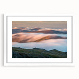 Abstract art print of Vail, Colorado in muted earth tones on a framed white mat, ideal for dining room decor.