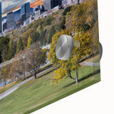 Large abstract depiction of Denver skyline in muted earth tones on acrylic glass, suitable for dining room art.