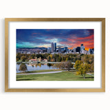 Extra large abstract art print of Denver skyline in muted earth tones on a textured canvas, framed in gold.