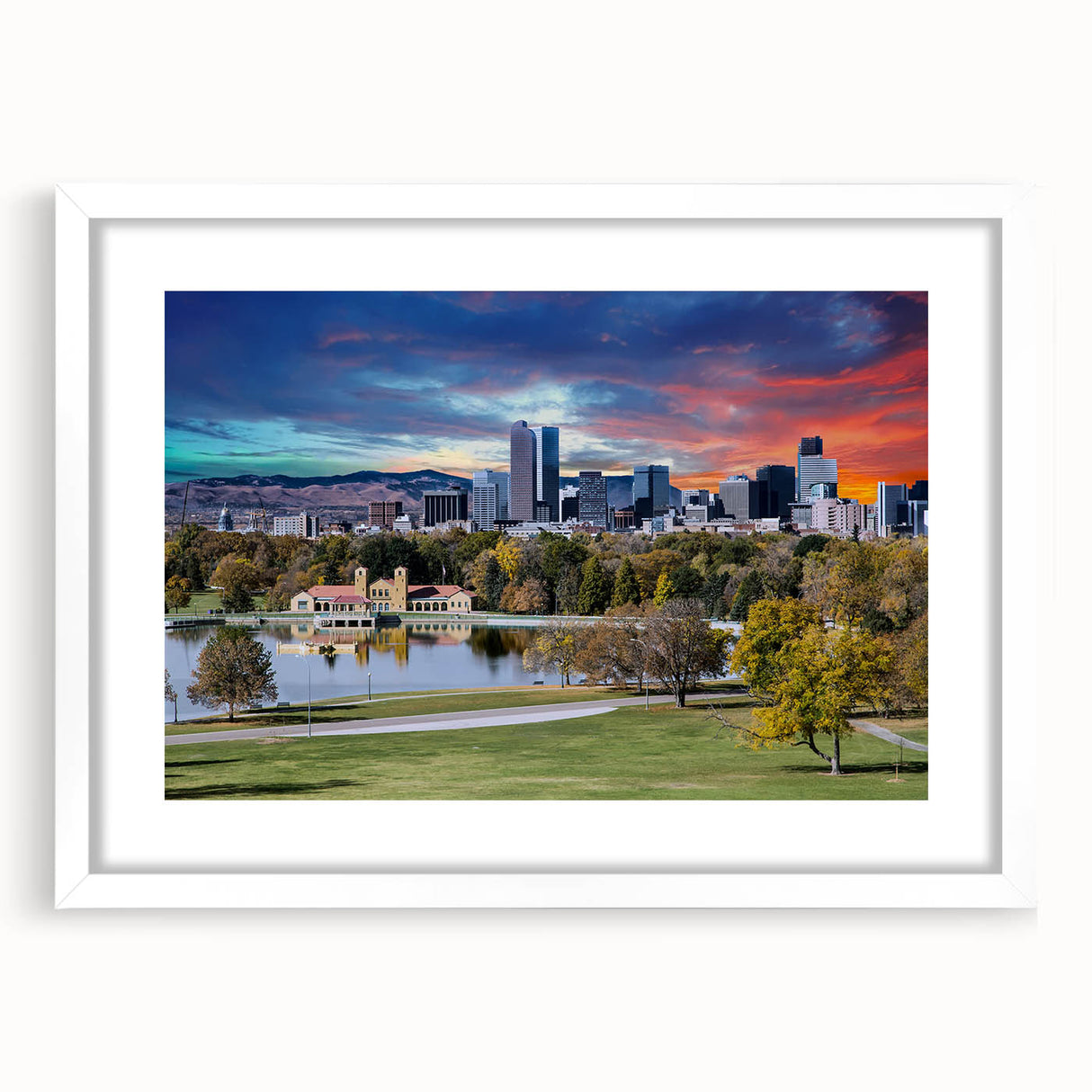 Abstract art print of Denver skyline in muted blue and gray tones on a framed white mat, ideal for dining room decor.