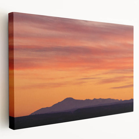 Large art depicting Pikes Peak in Colorado with muted earth tones on stretched canvas, suitable for kitchen wall art.