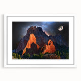 Abstract art print of Colorado Springs in muted blue and green tones on a framed white mat, ideal for dining room decor.