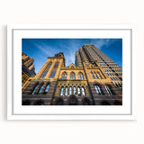 Abstract art print depicting a serene Connecticut landscape in muted blue and green tones, framed in white.