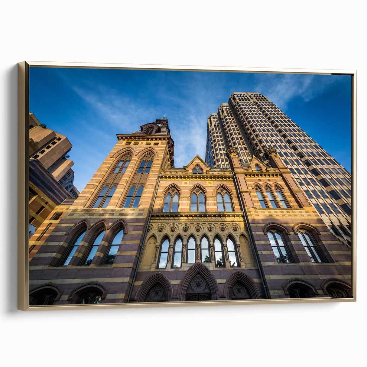 Framed canvas of a Connecticut landscape in vintage poster style with gold frame, ideal for bedroom wall art.
