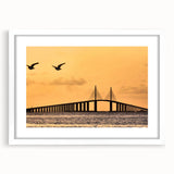 Abstract art print of Tampa skyline in muted blue and gray tones on a framed white mat.
